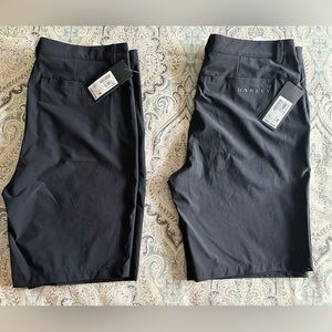 Two pairs of Oakley golf shorts size 34 and size 36 black. Brand new with tags.